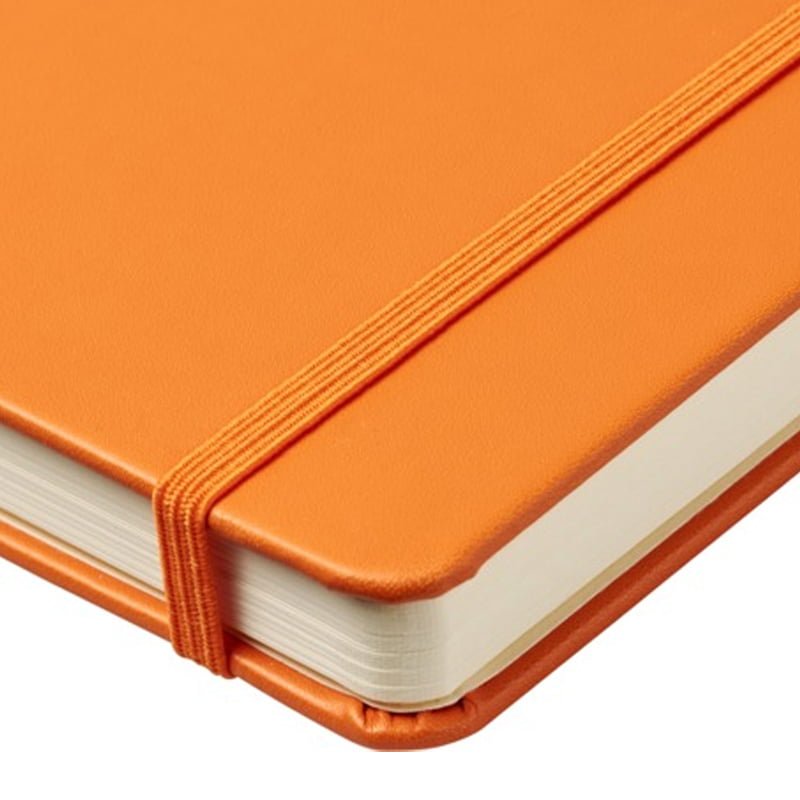 Elastic strap on an orange branded notebook